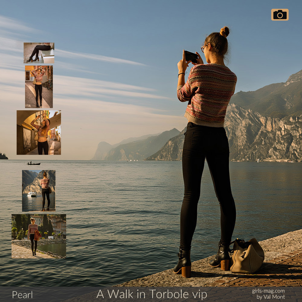 Pearl in Torbole macht ein Foto vom ruhigen Gardasee